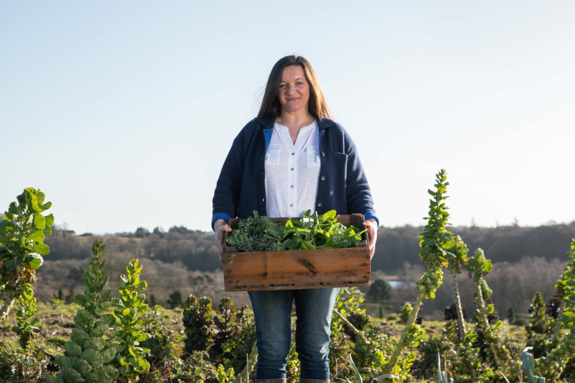 Farmer holding produce